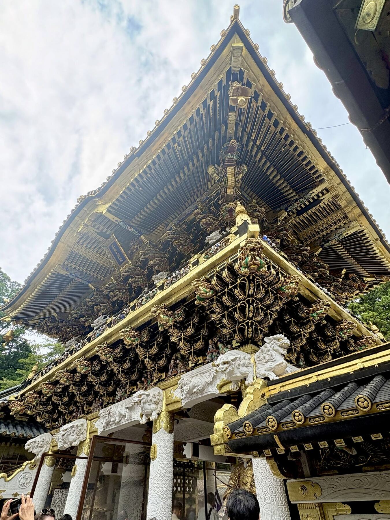 Ornate carved and gilded details on a gate at Nikkō Tōshō-gū